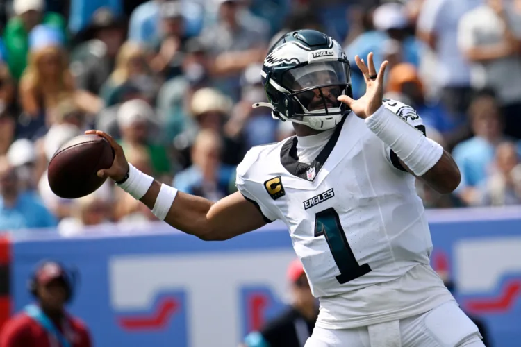 Hurts, Cooper connect late as Eagles avoid colossal upset
